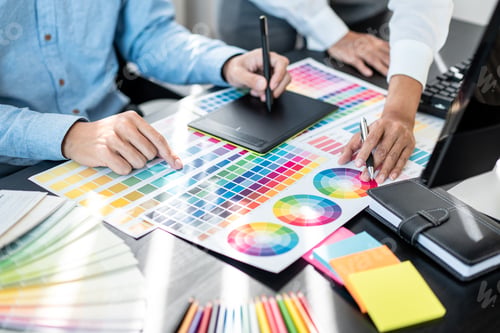 Preview: Team of creative graphic designer working on color swatch samples chart for selection coloring
