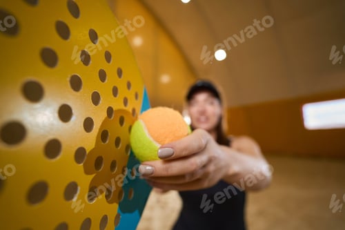 Preview: Woman is getting ready to pass a tennis ball