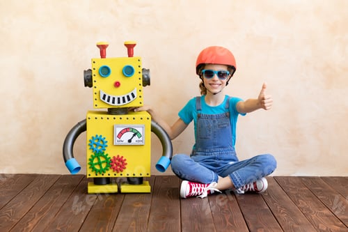 Preview: Happy child with toy robot