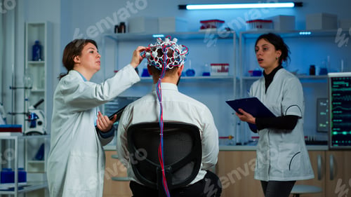 Preview: Man wearing performant eeg headset scanning brain electrical activity