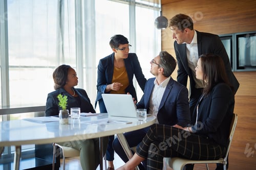 Preview: Shot of a group of corporate businesspeople working in the boardroom