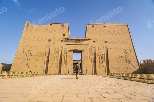 Preview: A young tourist entering the Temple of Edfu in the city of Edfu, Egypt