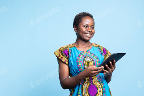 Preview: African american model reads news on online websites,