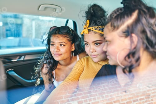 Preview: Friends sharing a moment in a car ride.