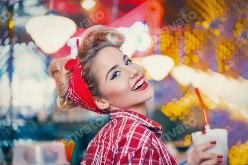 Preview: Happy woman in cafe