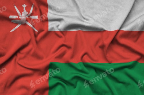 Preview: Oman flag is depicted on a sports cloth fabric with many folds. Sport team waving banner