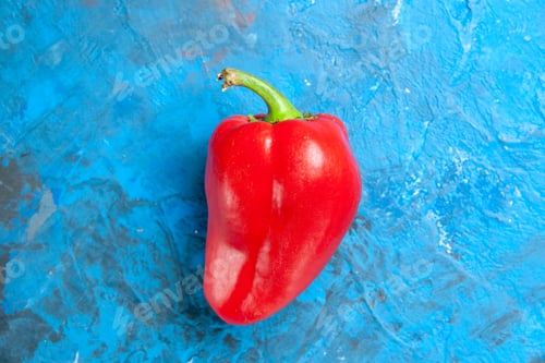 Preview: top view red bell-pepper on blue background salad color food vegetable photo