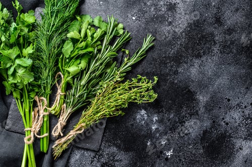 Preview: Assortment of fresh herbs coriander, rosemary, thyme, dill, parsley. A bunch of fresh condiments.