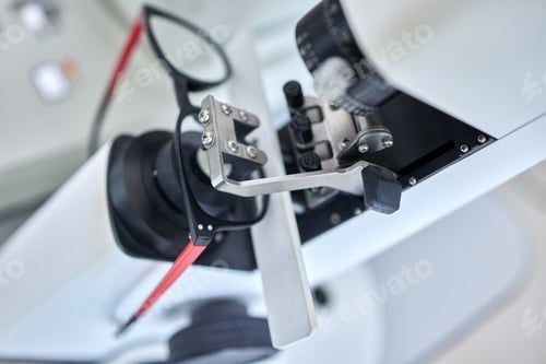 Preview: Optometry, vision and a lens meter in a clinic to measure or adjust the level of eyesight improveme