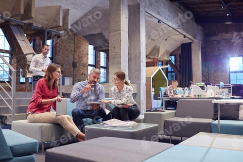 Preview: Business people having a informal meeting in communications pit