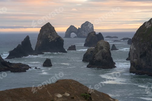 Preview: Rock formations on the sea at susnet