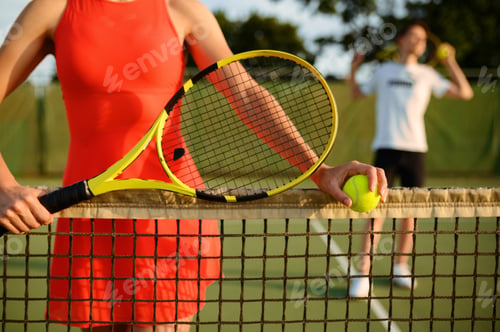 Preview: Male and female tennis players with rackets