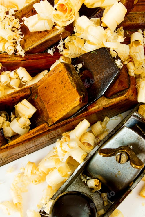 Preview: Joiner's works. Wooden shaving and plane