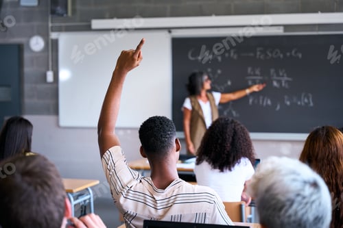 Preview: Young group of gen z students attending class at high school. Young black student boy asking