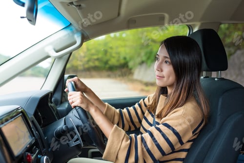 Preview: Woman driving car