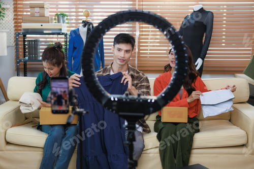 Preview: Young asian people recording video live streaming product review