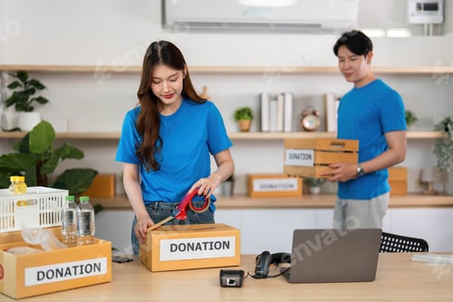 Preview: Volunteers packing donation boxes for community outreach