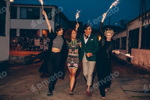 Preview: Friends walking down the city street with firework