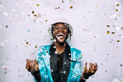 Preview: portrait of an hip hop music performer with confetti drop