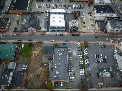 Preview: Aerial view of parking lots on the streets of Fort Lee, New Jersey at cloudy sunset