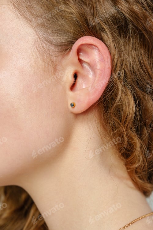 Preview: Young Womans Face Close Up Studio Shot