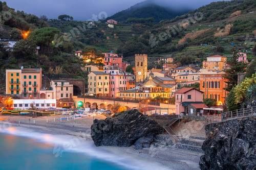 Preview: Monterosso, Italy in the Cinque Terre region at dusk on the Mediterranean Sea.
