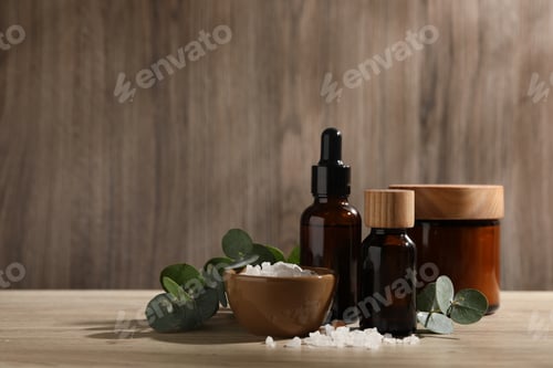 Preview: Composition with spa products and eucalyptus leaves on wooden table