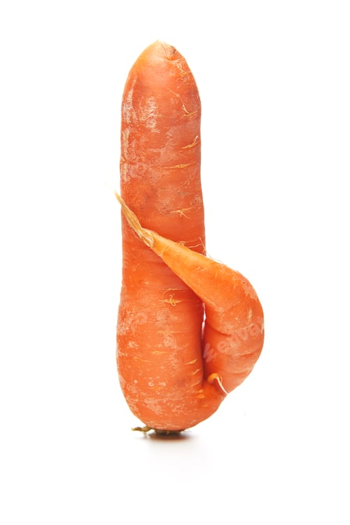 Preview: Fresh natural ugly raw carrot isolated on white background