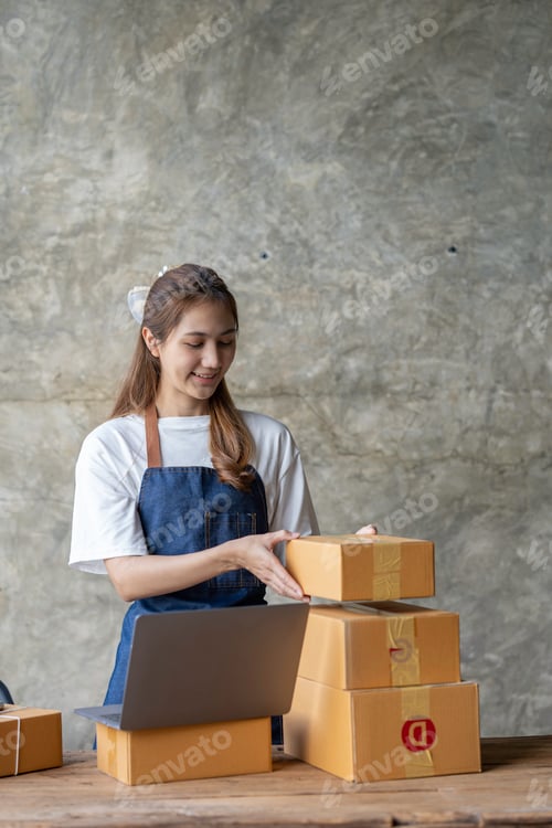 Preview: Portrait of Starting small businesses SME owners female entrepreneurs working on receipt box and che