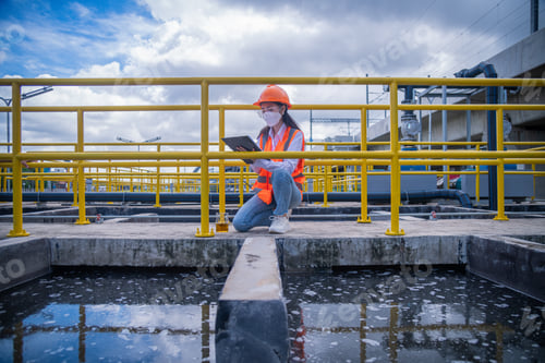 Preview: Engineer take water from wastewater treatment pond to check the quality of the water. After going th