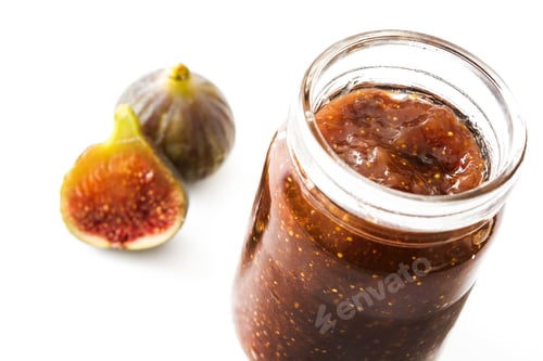 Preview: Homemade fig jam in a jar with fresh figs on white background