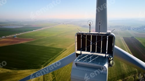 Preview: Aerial view of part of windmill turbine in countryside, Green energy