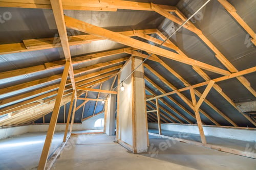 Preview: Attic of a building with wooden beams of a roof structure