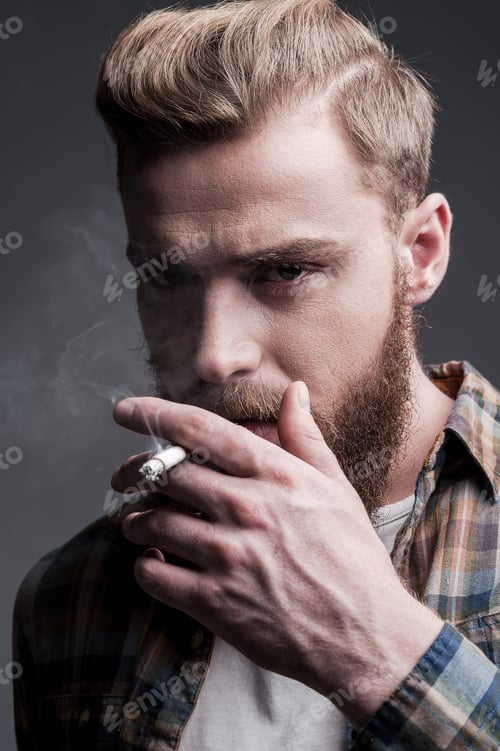Preview: Man smoking.