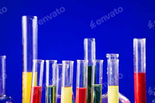 Preview: Chemistry lab equipment set on a table over blue background