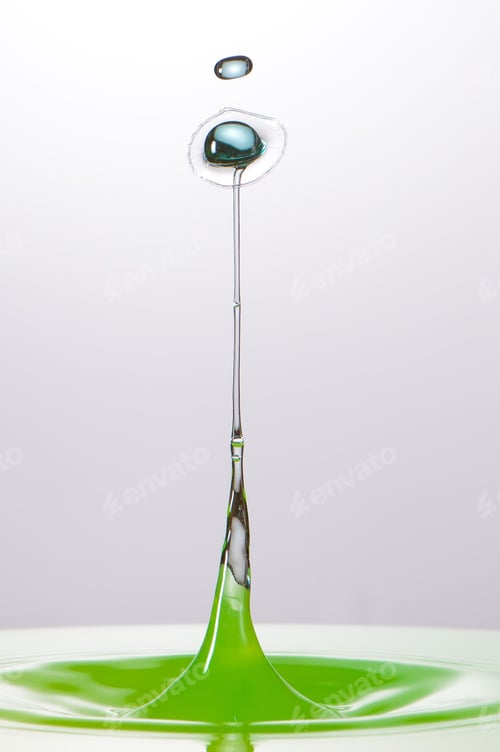 Preview: Splash of colorful liquid with high speed flash
