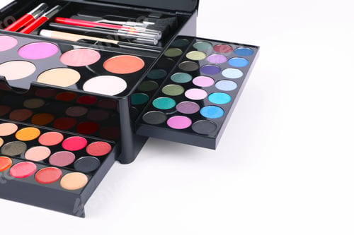 Preview: Large makeup case with different decorative cosmetics on white background