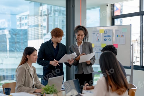 Preview: Group of young Asian business creative development planning strategy meeting and presentation