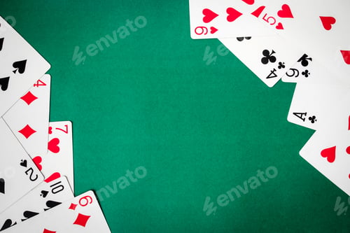 Preview: Playing cards on green background. Free space for text