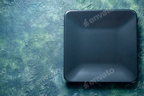 Preview: top view dark square plate on dark blue background food cutlery restaurant cafe kitchen