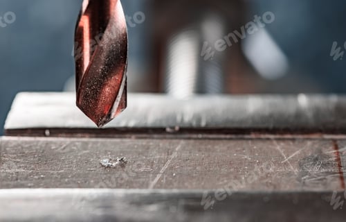 Preview: Drill close-up at the workplace in workshop