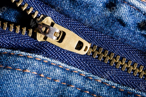 Preview: Closeup View of a Zipper on Denim Fabric