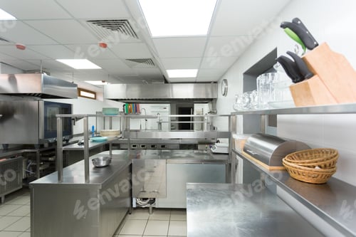 Preview: Modern kitchen setup with stainless steel equipment and organized workstations