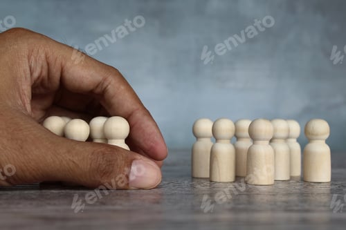 Preview: Hand separate group of wooden dolls