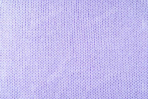 Preview: Bright Purple Knitwear Wool Fabric Texture Background. Abstract Textile Backdrop