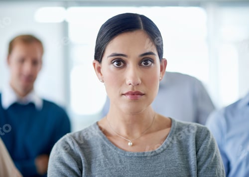 Preview: Confident Woman Posing in a Modern Office Setting