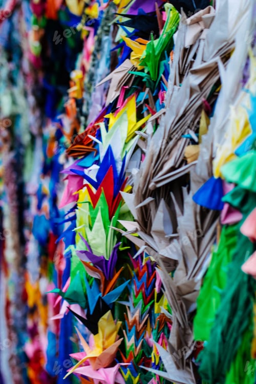 Preview: Closeup of colorful origami paper cranes