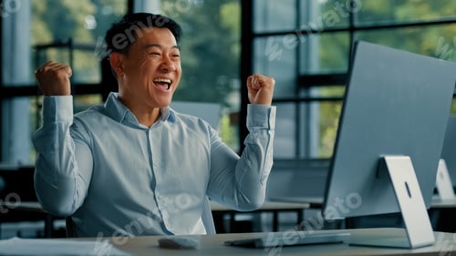Preview: Senior happy emotional businessman male winner investor 40s asian korean man celebrate business