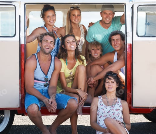 Preview: Group of friends hanging out in their mini van while on vacation by the seaside