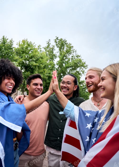 Preview: Cheerful group of young people holding the United States flag and the European Union flag